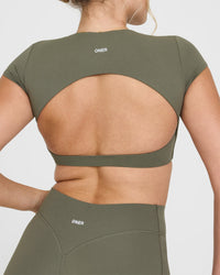 SoftMotion™ Short Sleeve Crop Top with White Logo | Alpine Green