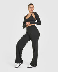 SoftMotion™ Long Sleeve Shrug with White Logo | Soft Black