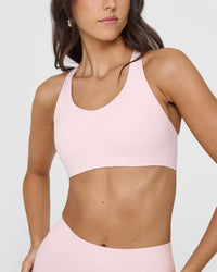 SoftMotion™ Sports Bra with White Logo | Ballet Pink