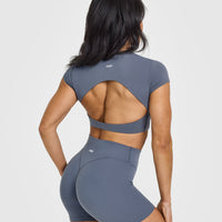 SoftMotion™ Short Sleeve Crop Top with White Logo | Granite Blue