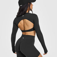 SoftMotion™ Long Sleeve Crop Top with White Logo | Soft Black