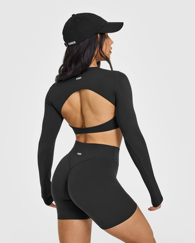 SoftMotion™ Long Sleeve Crop Top with White Logo | Soft Black