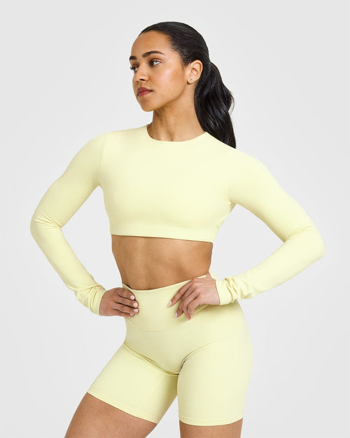 Oner Modal SoftMotion™ Long Sleeve Crop Top with White Logo | Pastel Yellow