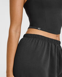 Mellowâ„¢ Rib Halter Neck Mid Vest with Built in Bra Shelf | Soft Black