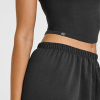 Mellowâ„¢ Rib Halter Neck Mid Vest with Built in Bra Shelf | Soft Black