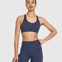 SoftMotion™ Sports Bra with White Logo | True Blue