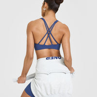 EasyLift™ High Neck Sports Bra with White Logo | Shadow Blue