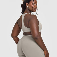 SoftMotion™ Bralette with White Logo | Warm Sand