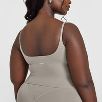 SoftMotion™ Strappy Mid Vest with Built in Bra Shelf with White Logo | Warm Sand