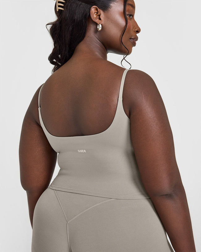 SoftMotion™ Strappy Mid Vest with Built in Bra Shelf with White Logo | Warm Sand