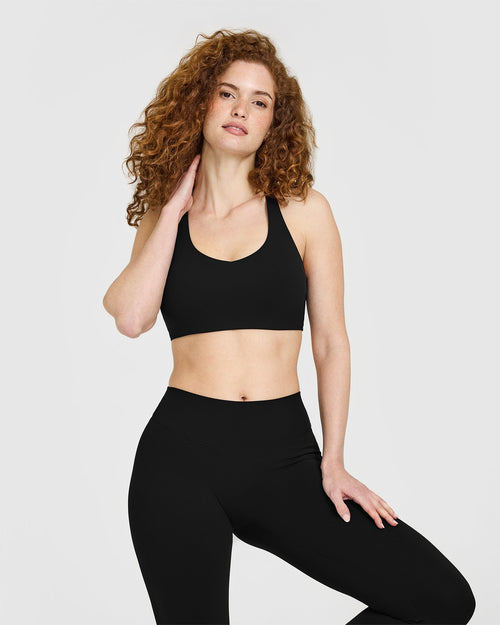 Oner Modal SoftMotion™ Sports Bra with White Logo | Black