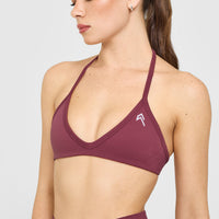 EnhanceLift™ Seamless Minimal Halter Neck Bralette with White Logo | Burnt Maroon