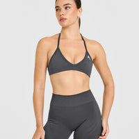 EnhanceLift™ Seamless Minimal Halter Neck Bralette with White Logo | Coal