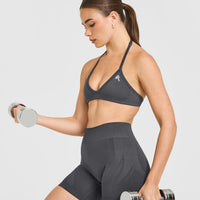 EnhanceLift™ Seamless Minimal Halter Neck Bralette with White Logo | Coal