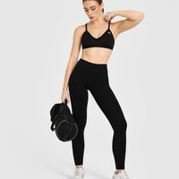EnhanceLift™ Seamless Strappy Sports Bra with White Logo | Black