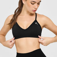 EnhanceLift™ Seamless Strappy Sports Bra with White Logo | Black
