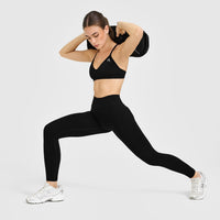 EnhanceLift™ Seamless Strappy Sports Bra with White Logo | Black