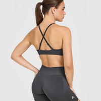 EnhanceLift™ Seamless Strappy Sports Bra with White Logo | Coal
