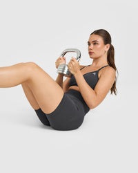 EnhanceLift™ Seamless Strappy Sports Bra with White Logo | Coal