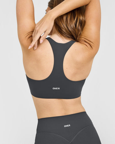 SoftMotion™ Sports Bra with White Logo | Coal