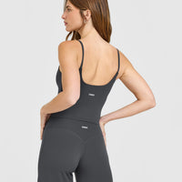 SoftMotion™ Strappy Mid Vest with Built in Bra Shelf with White Logo | Coal