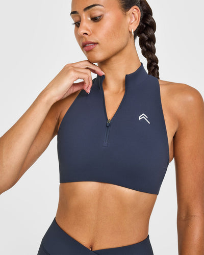 EasyLift™ Zip High Neck Sports Bra with White Logo | True Blue