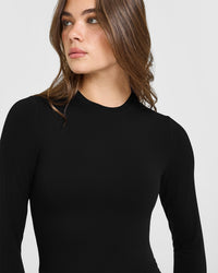 SoftMotion™ Long Sleeve Mid Top with White Logo | Black