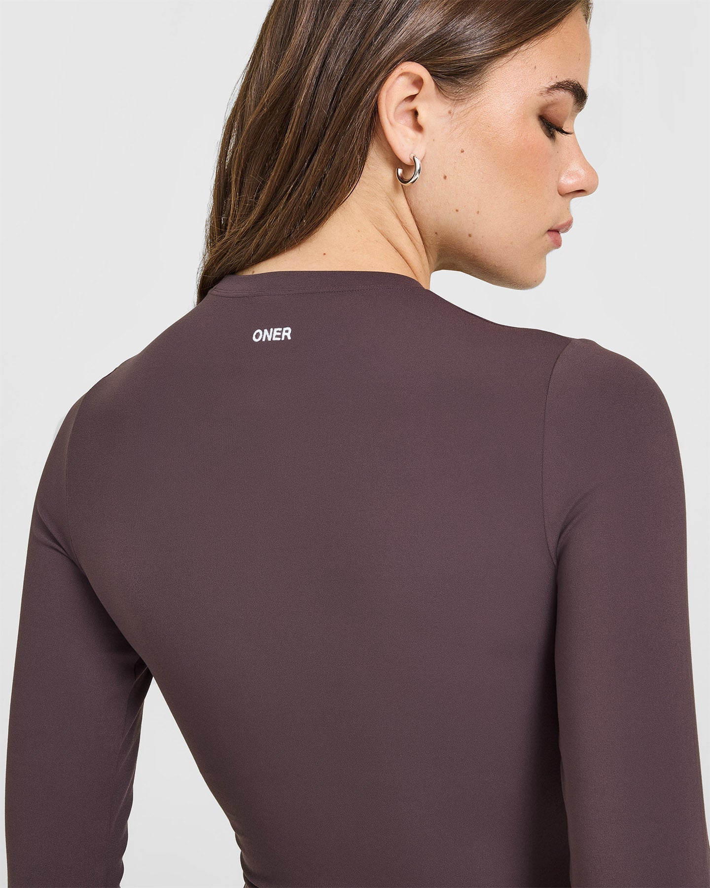 SoftMotion™ Long Sleeve Mid Top with White Logo | Dark Umber Brown