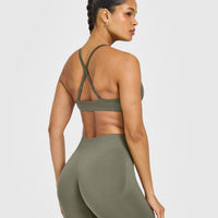 EnhanceLift™ Seamless Strappy Sports Bra with White Logo | Alpine Green