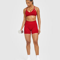 EnhanceLift™ Seamless Strappy Sports Bra with White Logo | Light Toasted Red