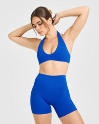 SoftMotion™ Minimal Halter Neck Bralette with White Logo | Light Cobalt Blue