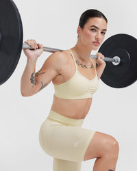 Effortless Strappy Bralette with White Logo | Vanilla