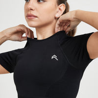 Effortless Seamless Short Sleeve Crop Top with White Logo | Black