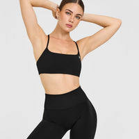 EasyLift™ Strappy Sports Bra with White Logo | Black