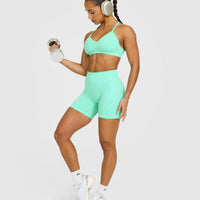EnhanceLift™ Seamless Strappy Sports Bra with White Logo | Peppermint Green