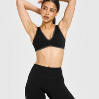 SoftMotion™ Contrast Scoop Back Bralette with White Logo | Black