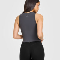 SoftMotion™ High Neck Mid Vest with White Logo | Coal