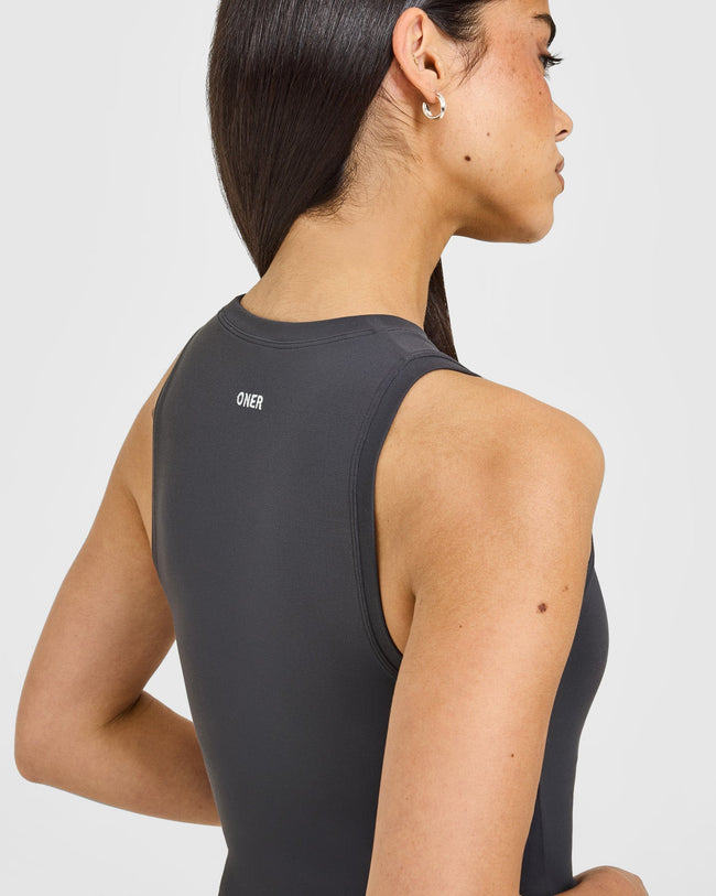 SoftMotion™ High Neck Mid Vest with White Logo | Coal