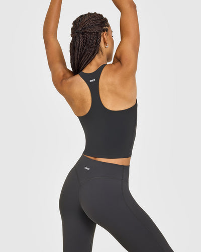 SoftMotion™ Racer Back Mid Vest with Built in Bra Shelf with White Logo | Coal