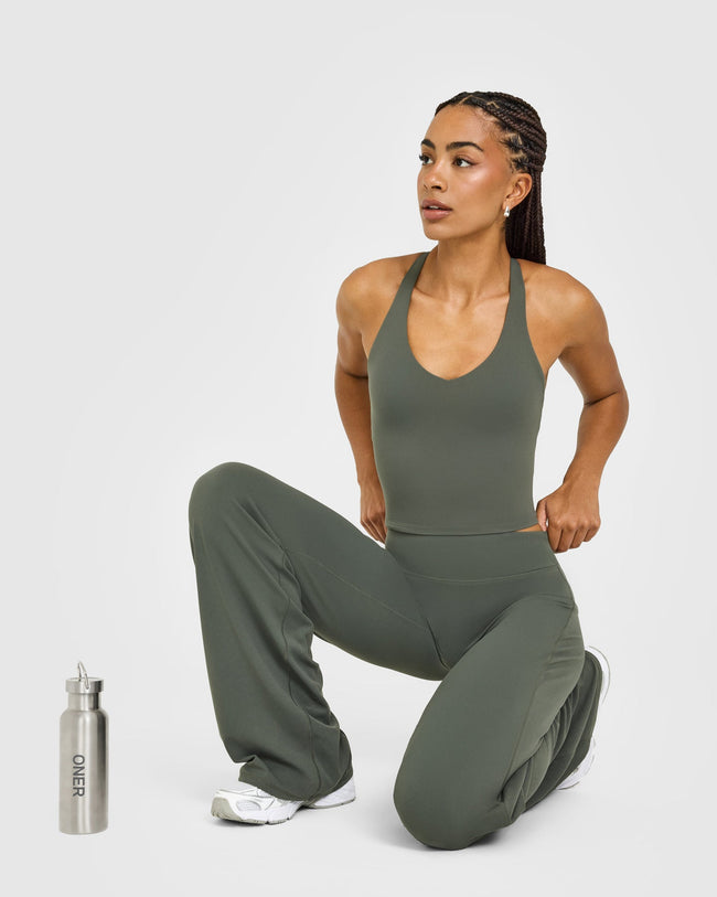 SoftMotion™ Racer Back Mid Vest with Built in Bra Shelf with White Logo | Dark Khaki