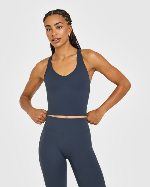 Oner Modal SoftMotion™ Racer Back Mid Vest with Built in Bra Shelf with White Logo | True Blue