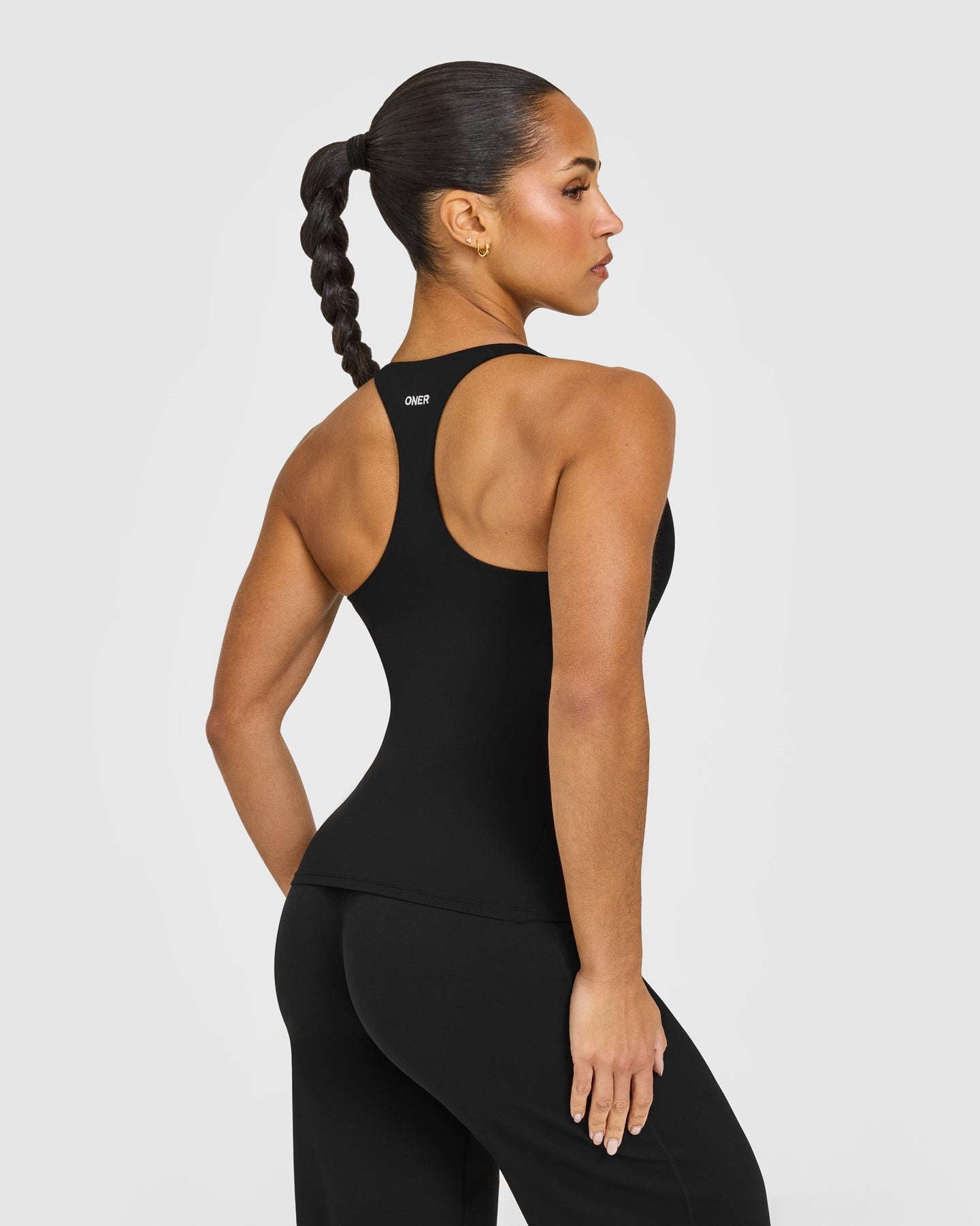 SoftMotion™ Racer Back Vest with Built in Bra Shelf with White Logo | Black
