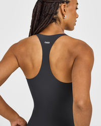 SoftMotion™ Racer Back Vest with Built in Bra Shelf with White Logo | Coal