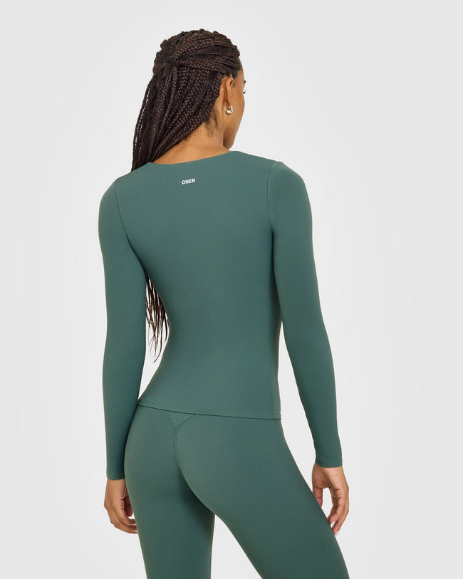 SoftMotion™ Scoop Neck Long Sleeve Top with Built in Bra Shelf with White Logo | Iced Green