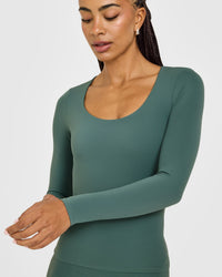 SoftMotion™ Scoop Neck Long Sleeve Top with Built in Bra Shelf with White Logo | Iced Green