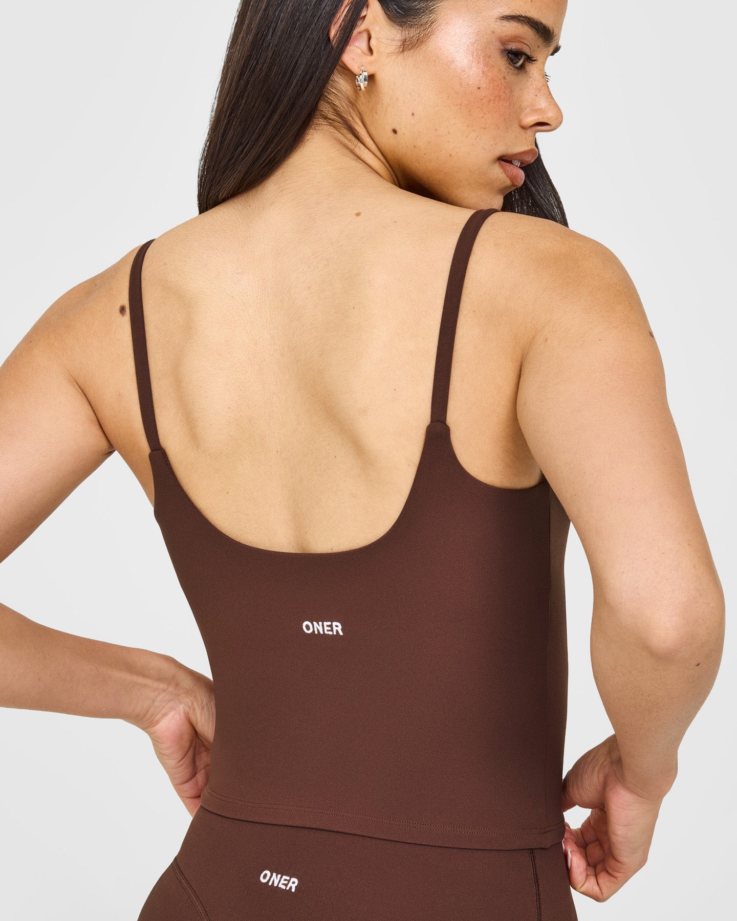 SoftMotion™ Strappy Mid Vest with Built in Bra Shelf with White Logo | Espresso Brown