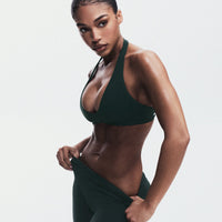 SoftMotion™ Minimal Halter Neck Bralette with Grey Logo | Emerald Noir