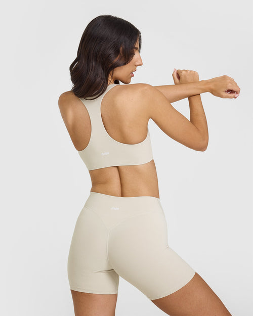 SoftMotion™ Sports Bra with White Logo | Sand