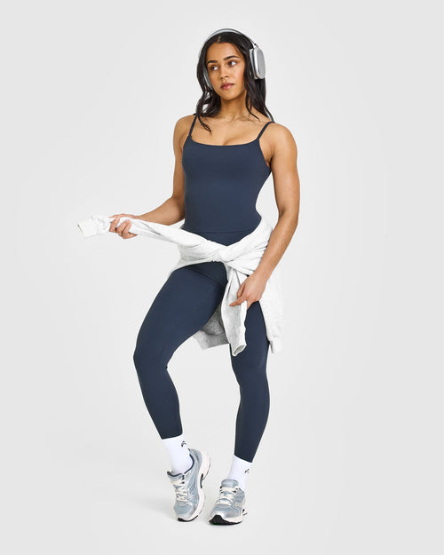 SoftMotion™ Strappy Mid Vest with Built in Bra Shelf with White Logo | True Blue