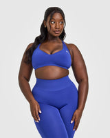 Effortless Seamless Racer Back Sports Bra with White Logo | Space Blue